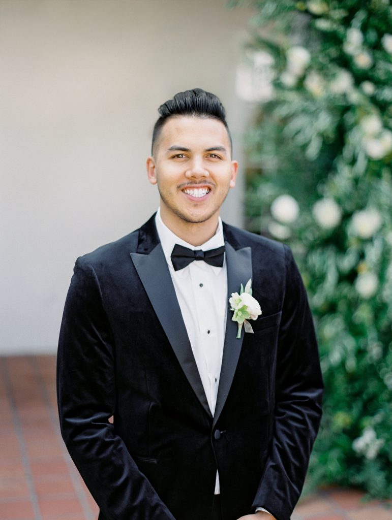 Darlington House in La Jolla wedding groom wearing velvet tuxedo portrait photo