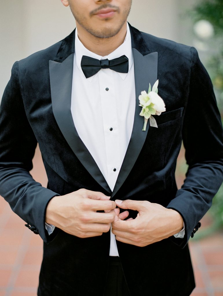 Darlington House in La Jolla wedding groom wearing black velvet tuxedo photo
