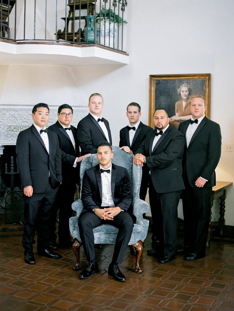 Darlington House in La Jolla wedding groomsmen seated photo