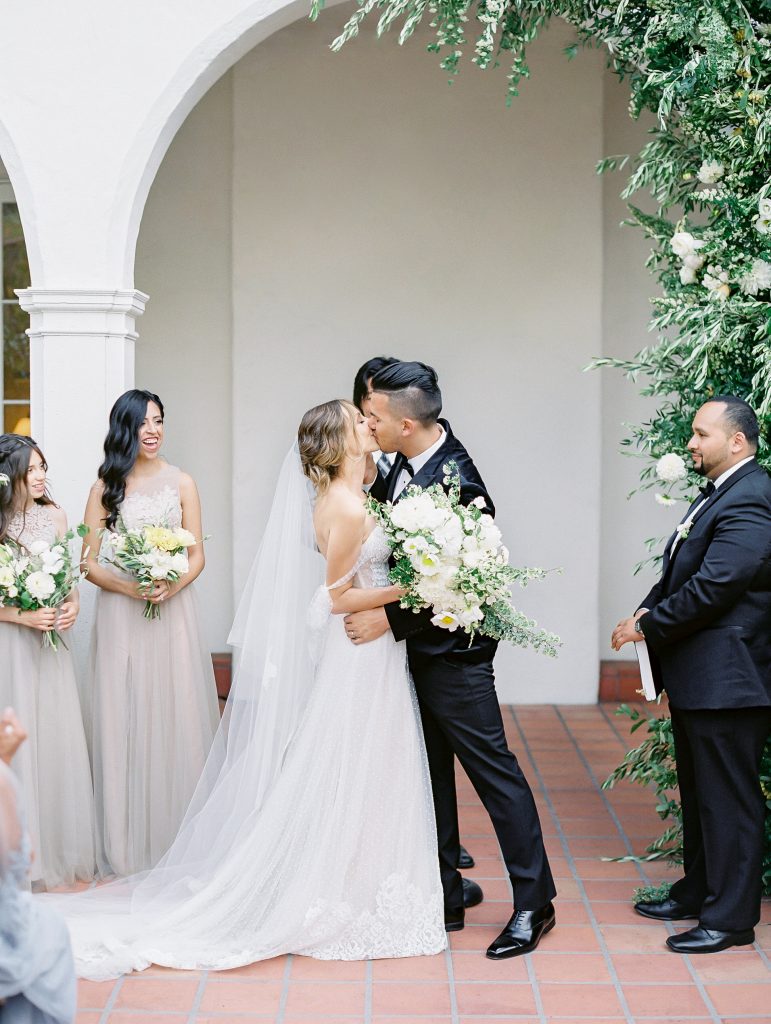 Darlington House in La Jolla wedding bride and groom kissing ceremony photo