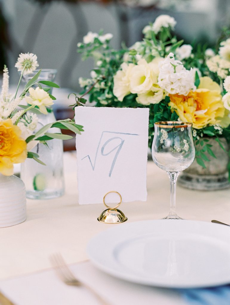 Darlington House in La Jolla wedding reception table blue and yellow decor table numbers photo