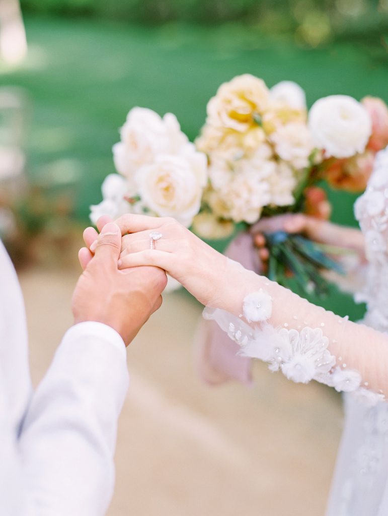 Kestrel Park in Santa Ynez wedding bride and groom holding hands photo