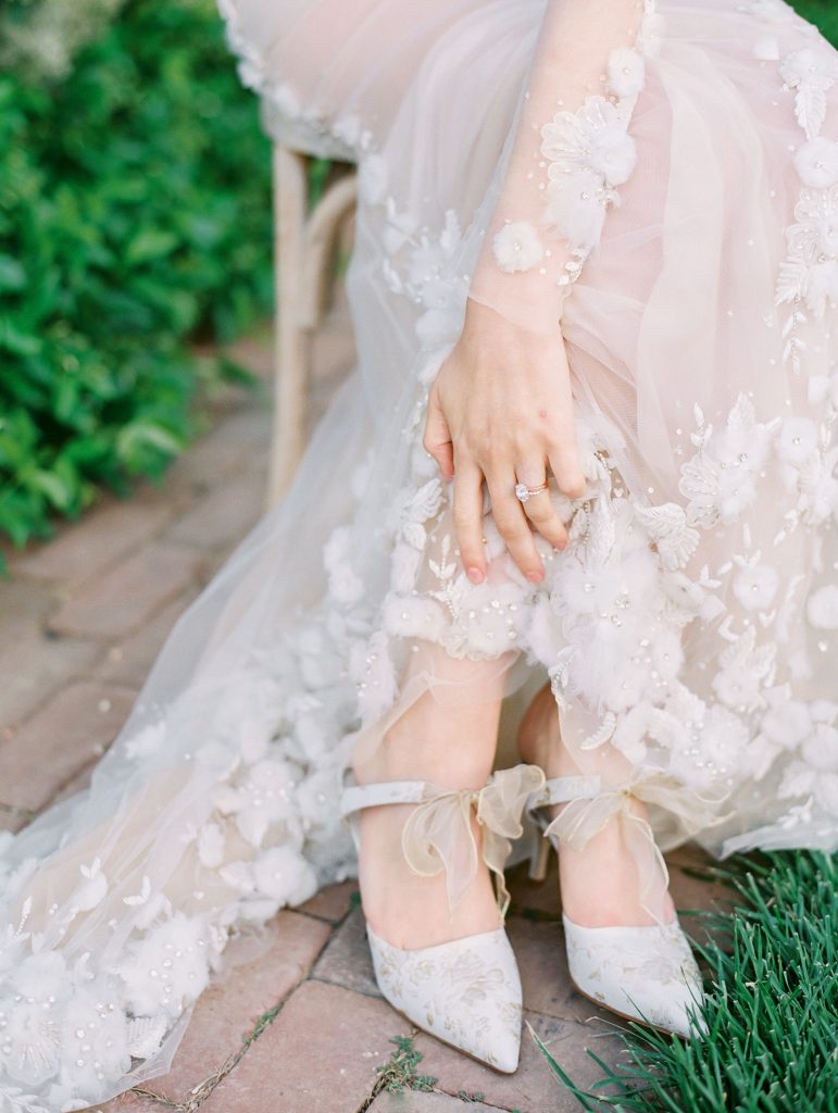 Kestrel Park in Santa Ynez wedding bride putting on shoes photo