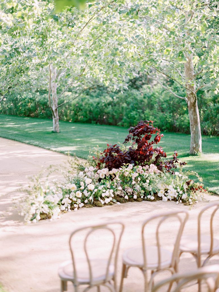 Kestrel Park in Santa Ynez wedding ceremony flowers curved arch photo