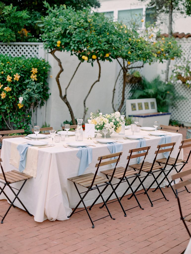 Darlington House in La Jolla wedding reception table blue and yellow decor lemon trees photo
